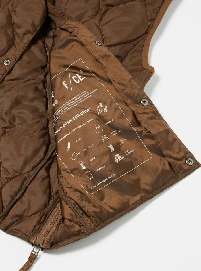 Taion By FCE Packable Down Vest In Brown Nylon RipstopDuck Down Men Universal Works Waistcoats and Gilets