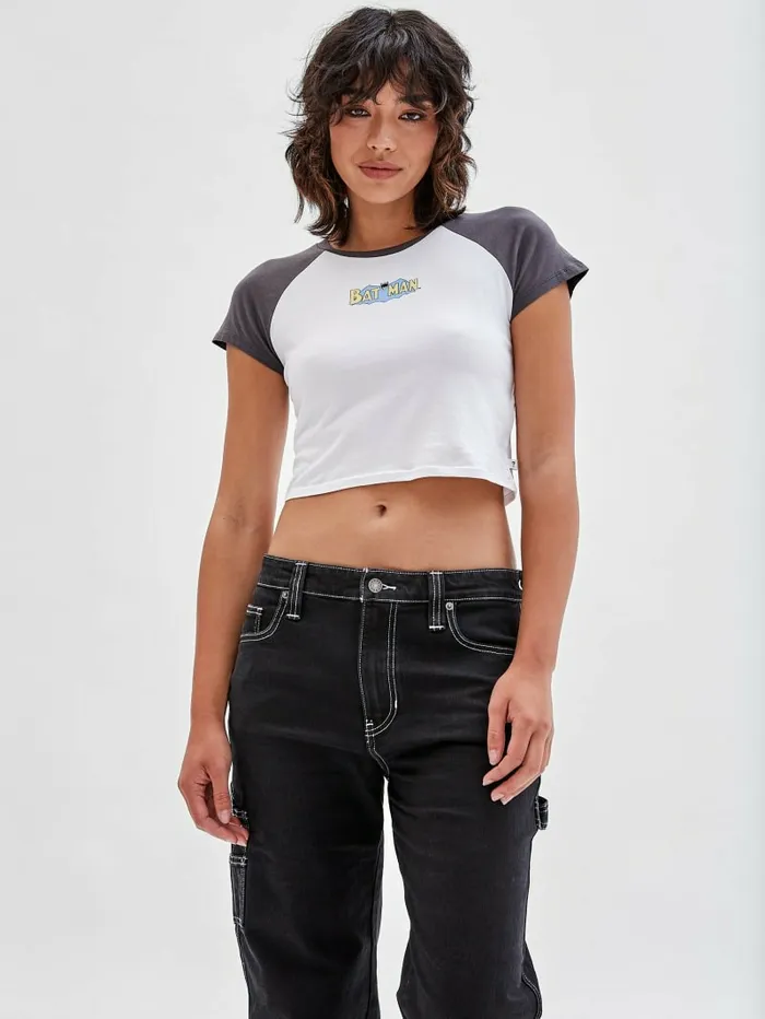 GUESS Originals x Batman Raglan Cropped Baby Tee Pure White Multi Tops GUESS Women GUESS Originals x Batman Raglan Cropped Baby Tee Pure White Multi Tops GUESS Women