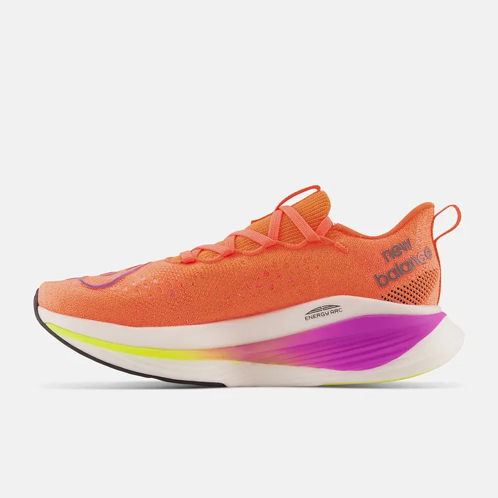 Women Running New Balance FuelCell SuperComp Elite v3 Cosmic Rose with Neon Dragonfly and Cosmic Pineapple Women Running New Balance FuelCell SuperComp Elite v3 Cosmic Rose with Neon Dragonfly and Cosmic Pineapple