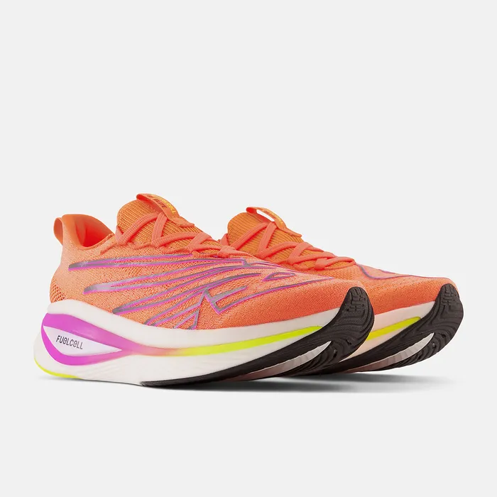 Women Running New Balance FuelCell SuperComp Elite v3 Cosmic Rose with Neon Dragonfly and Cosmic Pineapple Women Running New Balance FuelCell SuperComp Elite v3 Cosmic Rose with Neon Dragonfly and Cosmic Pineapple